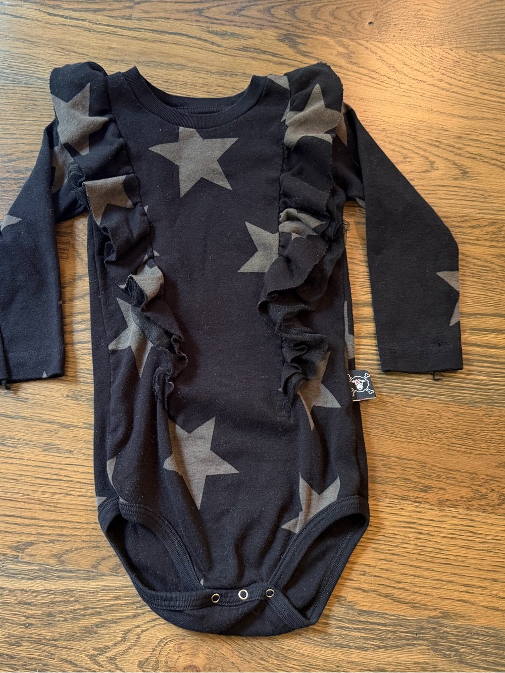 nununu Black Baby Girl Long Sleeve Onesie with Gray Stars and Ruffles